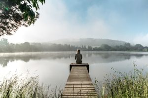 Calm morning meditation by pond