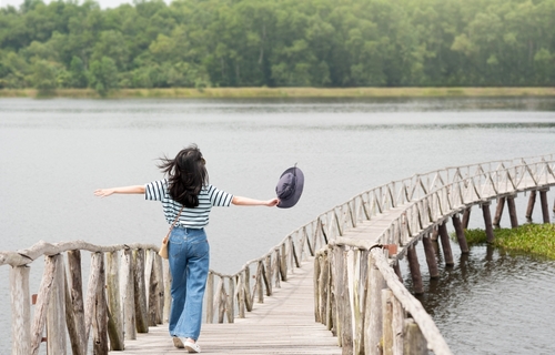 Happy young woman enjoying life